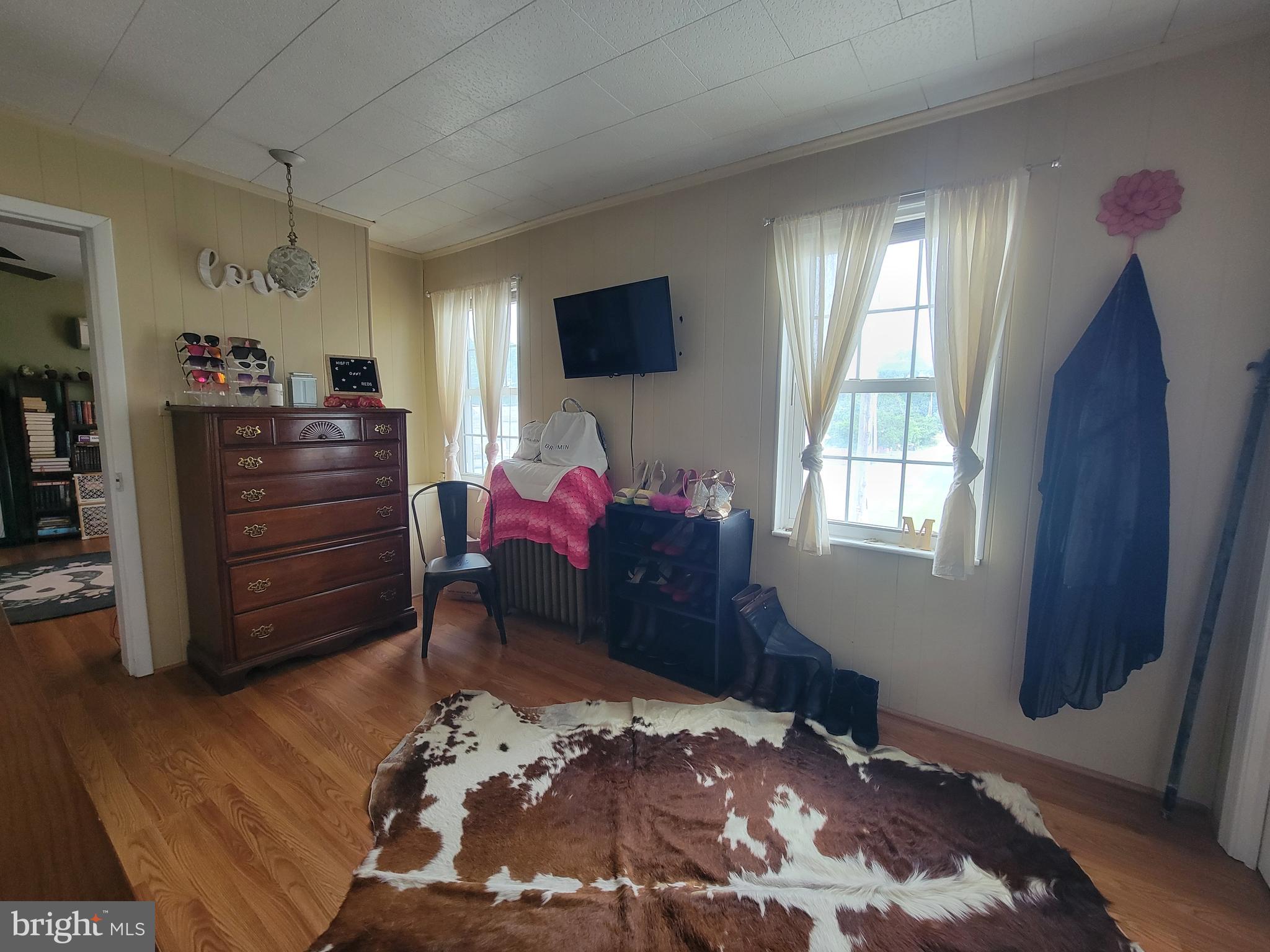 10 Whyte Street Union Bridge, MD 21791 - Photo 16 of 20 a bed room with a bed window and a mirror