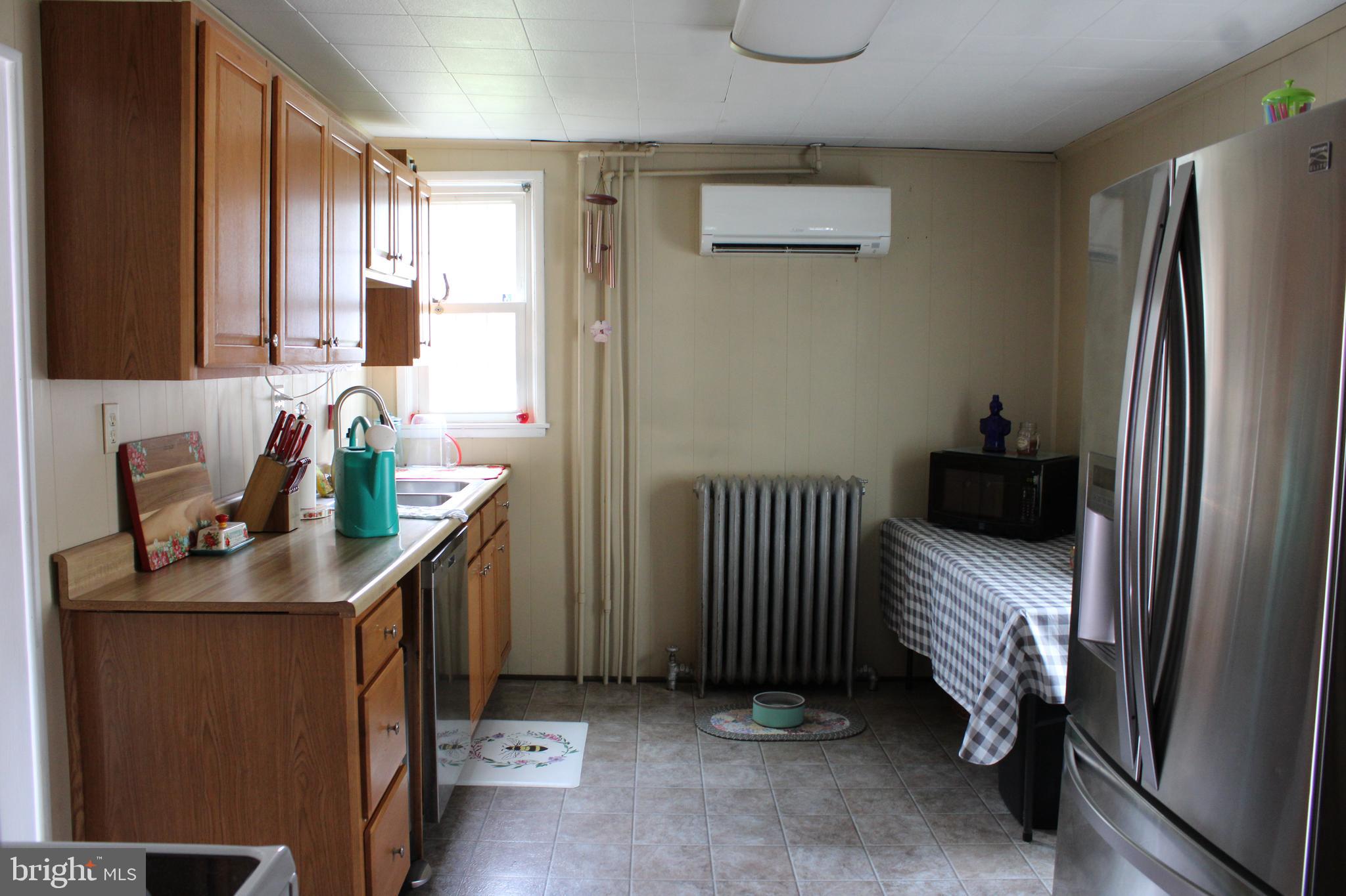 10 Whyte Street Union Bridge, MD 21791 - Photo 17 of 20 a bedroom with a bed and a window