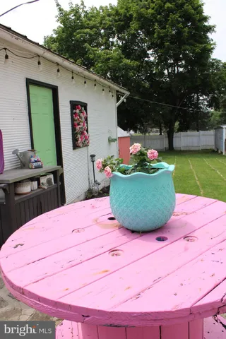 a view of a porch with a yard