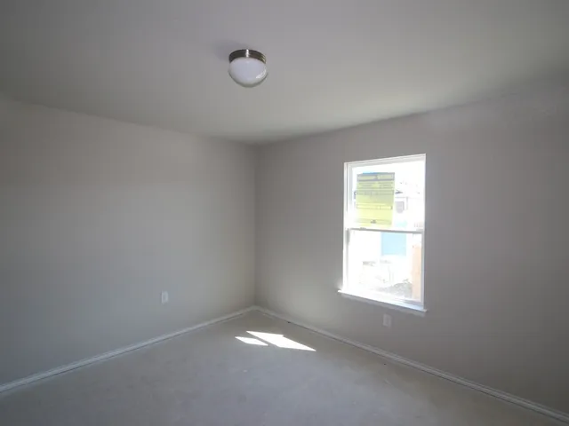an empty room with a window