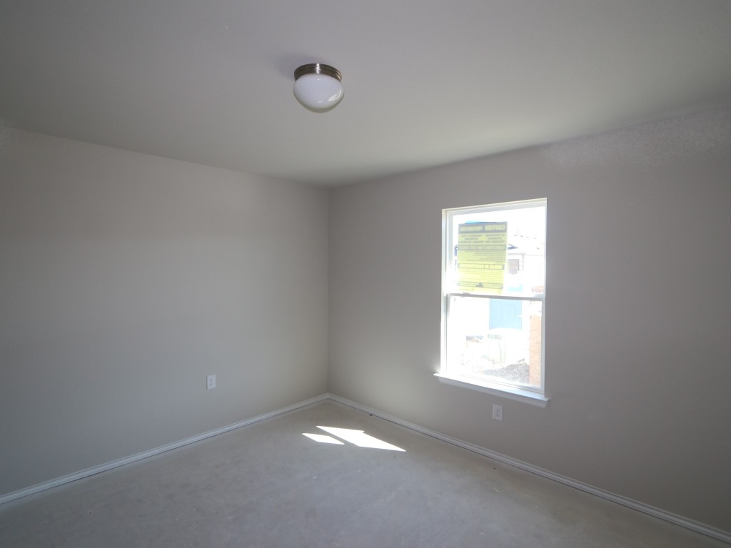 9204 Furman Drive Austin, TX 78747 - Photo 13 of 17 an empty room with a window