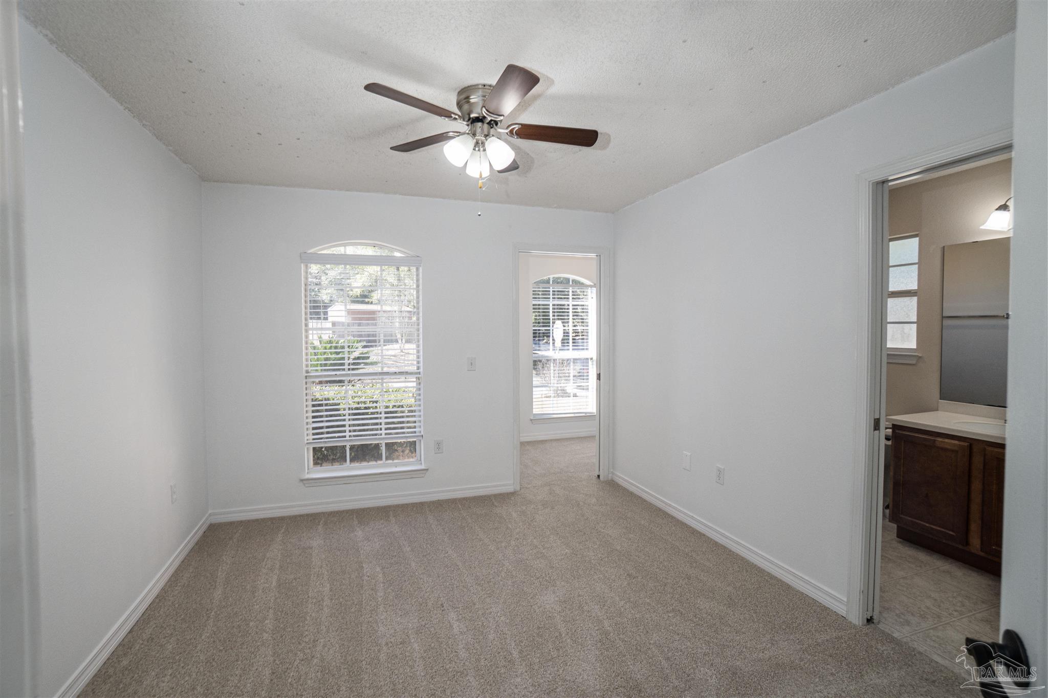 4836 Timber Ridge Drive Pace, FL 32571 - Photo 24 of 46 a view of an empty room with a window