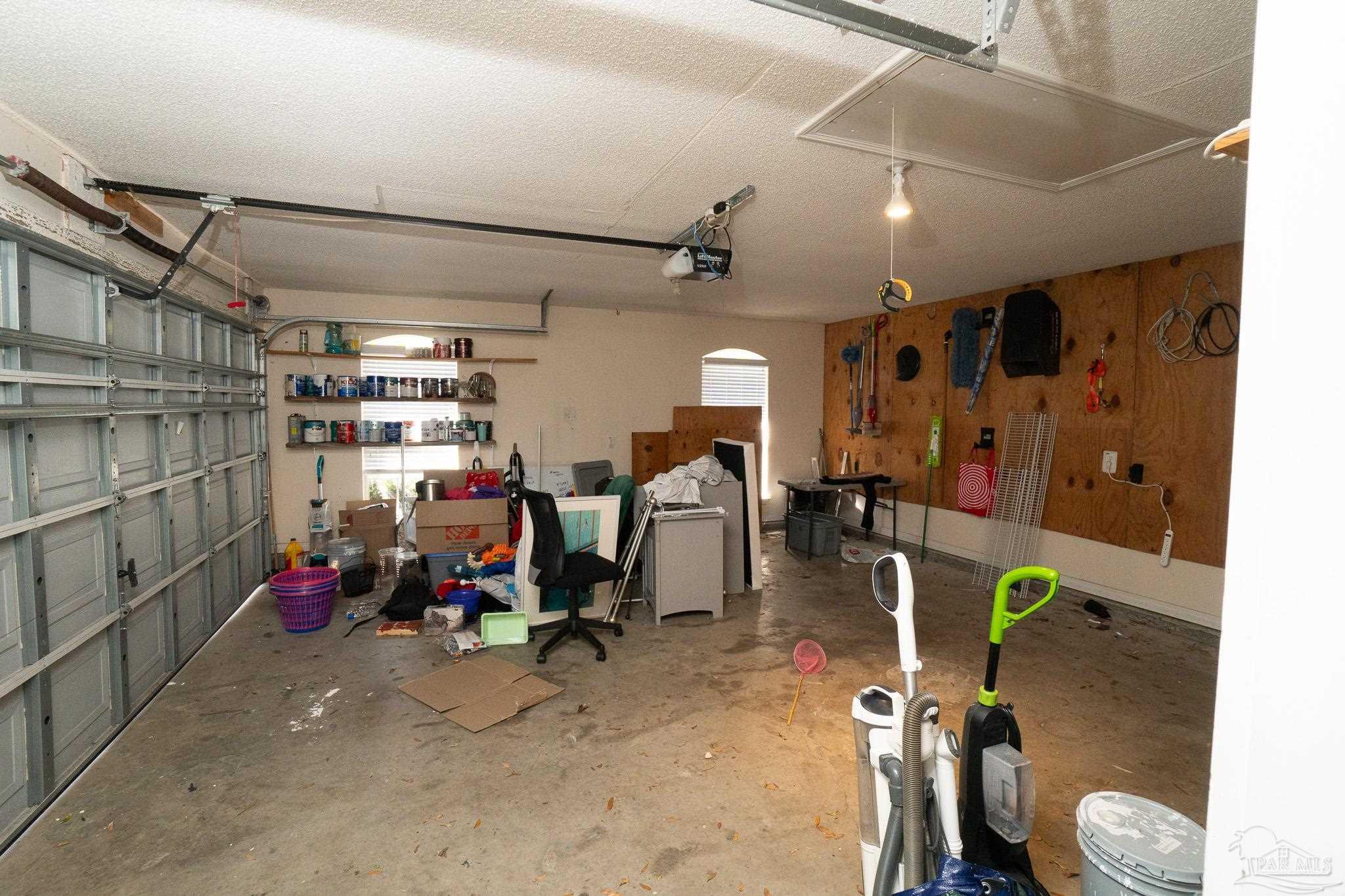 4836 Timber Ridge Drive Pace, FL 32571 - Photo 38 of 46 a view of a room with gym equipment