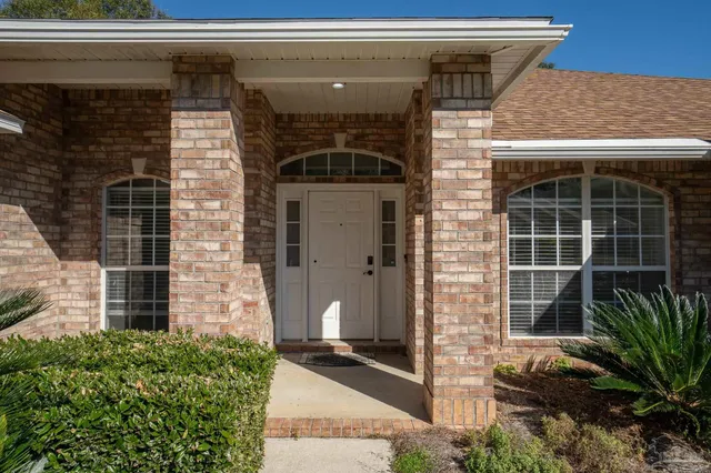 a front view of a house with a garage