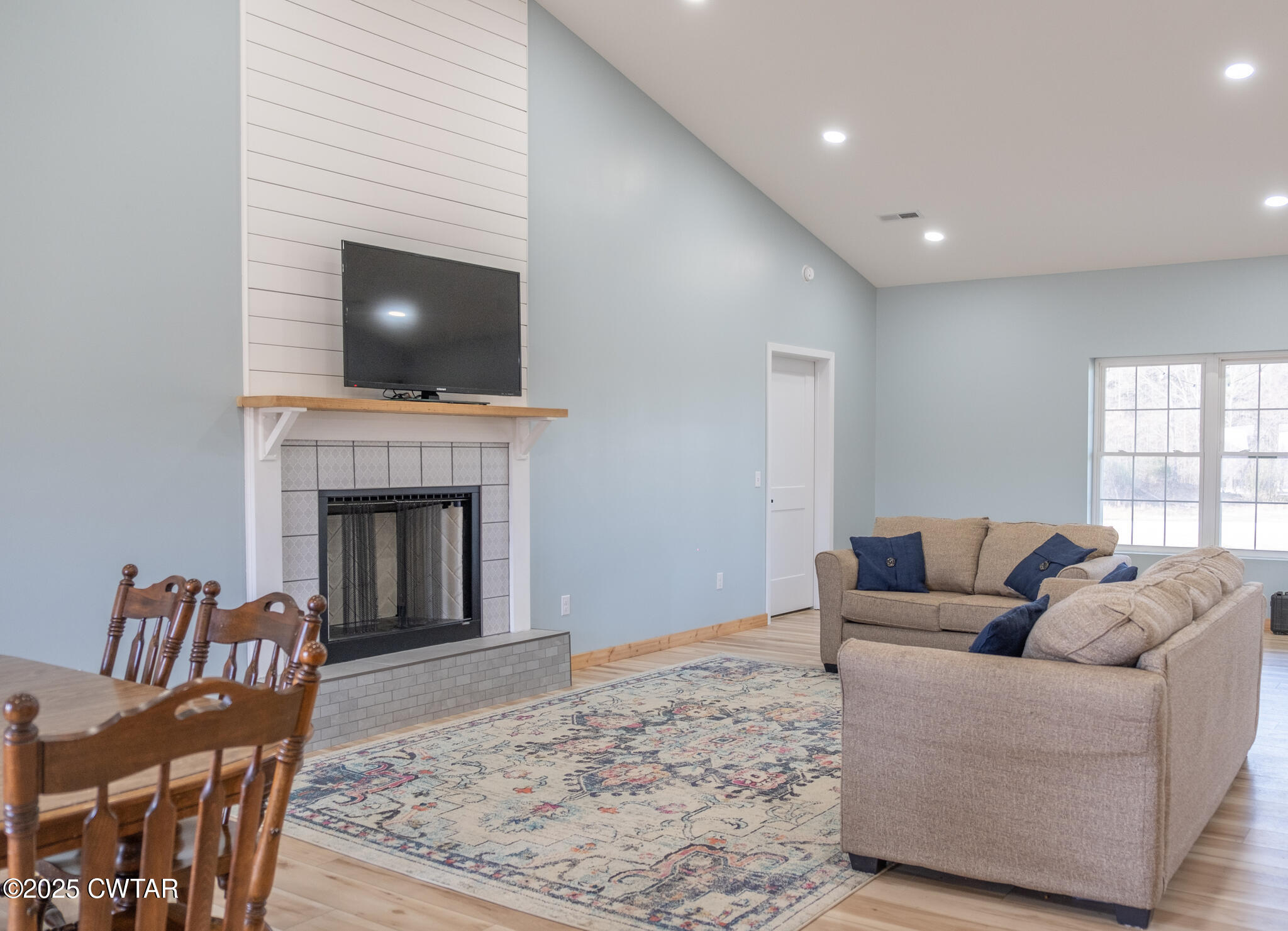 1375 White Clay Road Sharon, TN 38255 - Photo 14 of 58 a living room with furniture and a fireplace