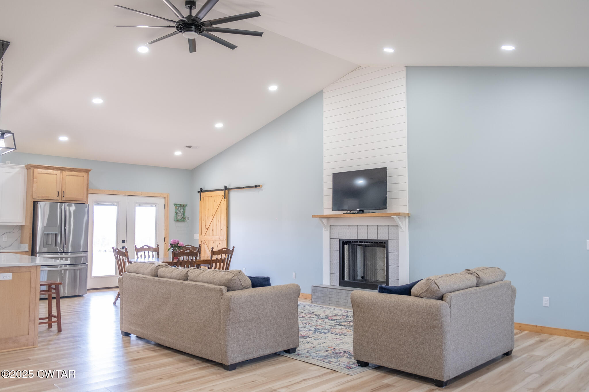 1375 White Clay Road Sharon, TN 38255 - Photo 18 of 58 a living room with furniture and a fireplace