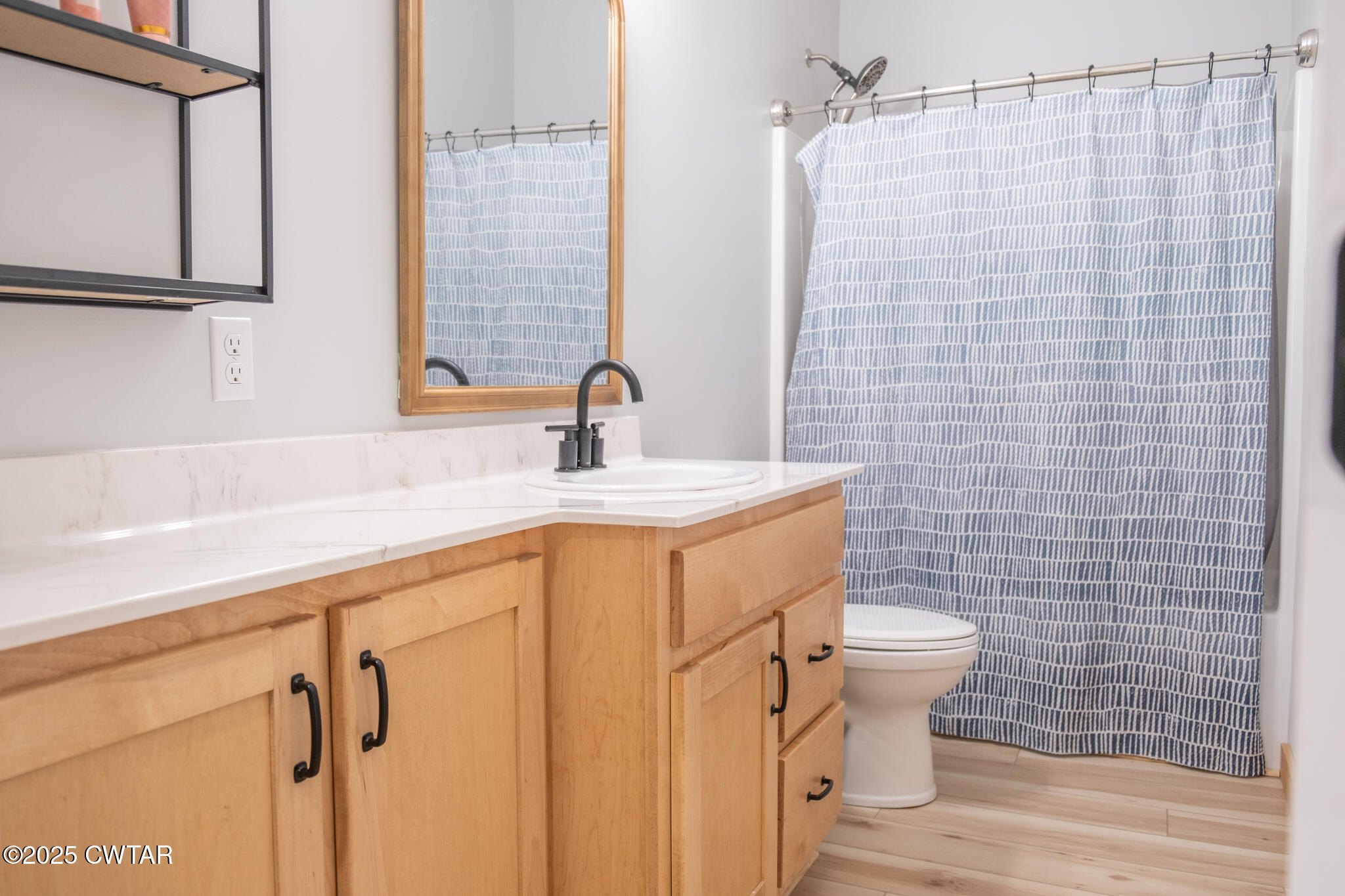 1375 White Clay Road Sharon, TN 38255 - Photo 22 of 58 a bathroom with a sink toilet and shower
