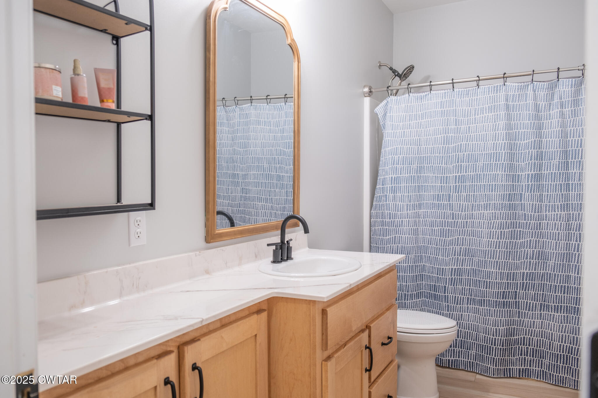 1375 White Clay Road Sharon, TN 38255 - Photo 23 of 58 a bathroom with a sink a toilet and shower