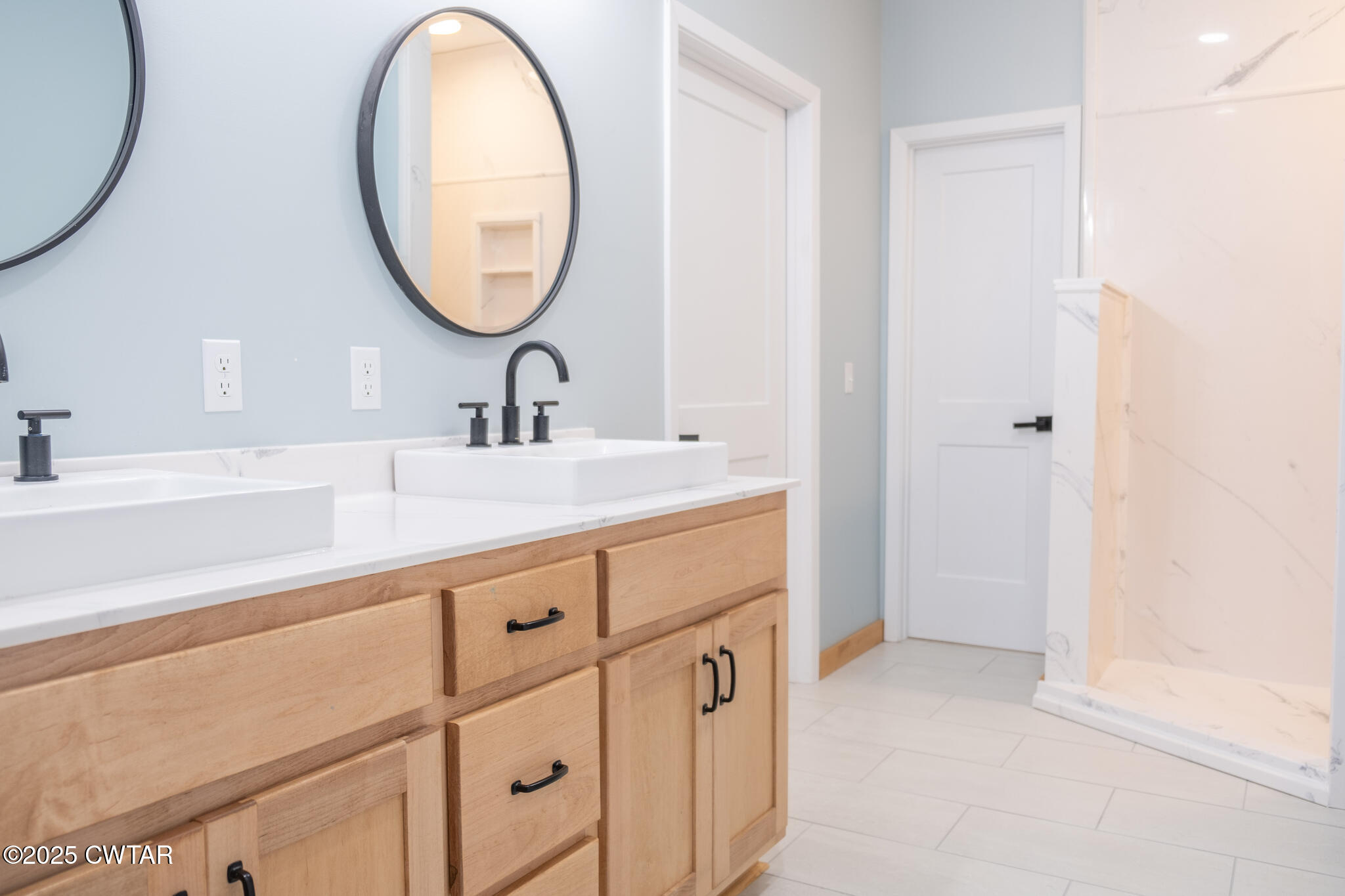 1375 White Clay Road Sharon, TN 38255 - Photo 43 of 58 a bathroom with a sink and a mirror