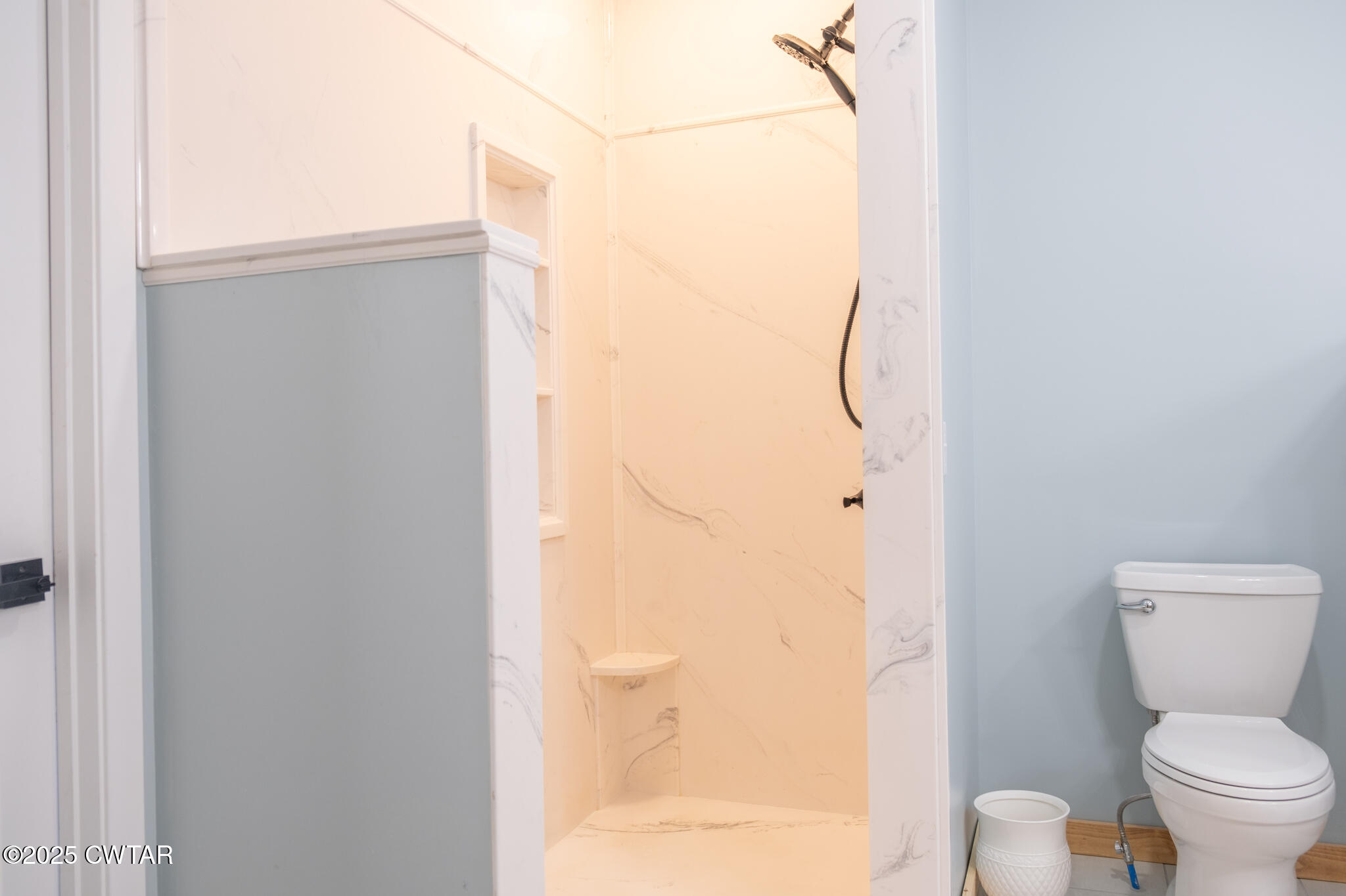 1375 White Clay Road Sharon, TN 38255 - Photo 44 of 58 a bathroom with a toilet and a shower