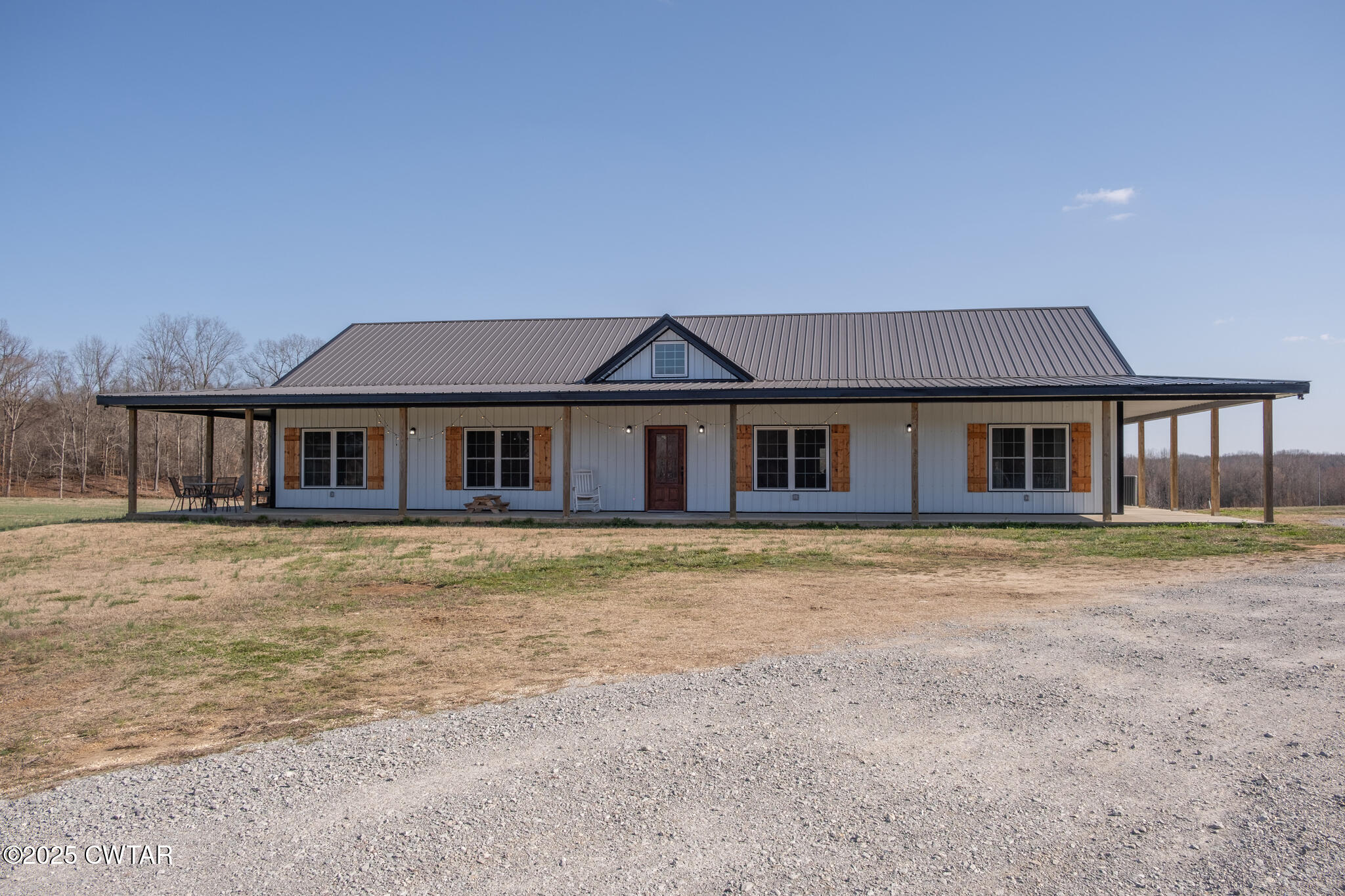 1375 White Clay Road Sharon, TN 38255 - Photo 55 of 58 a front view of a house with a garden