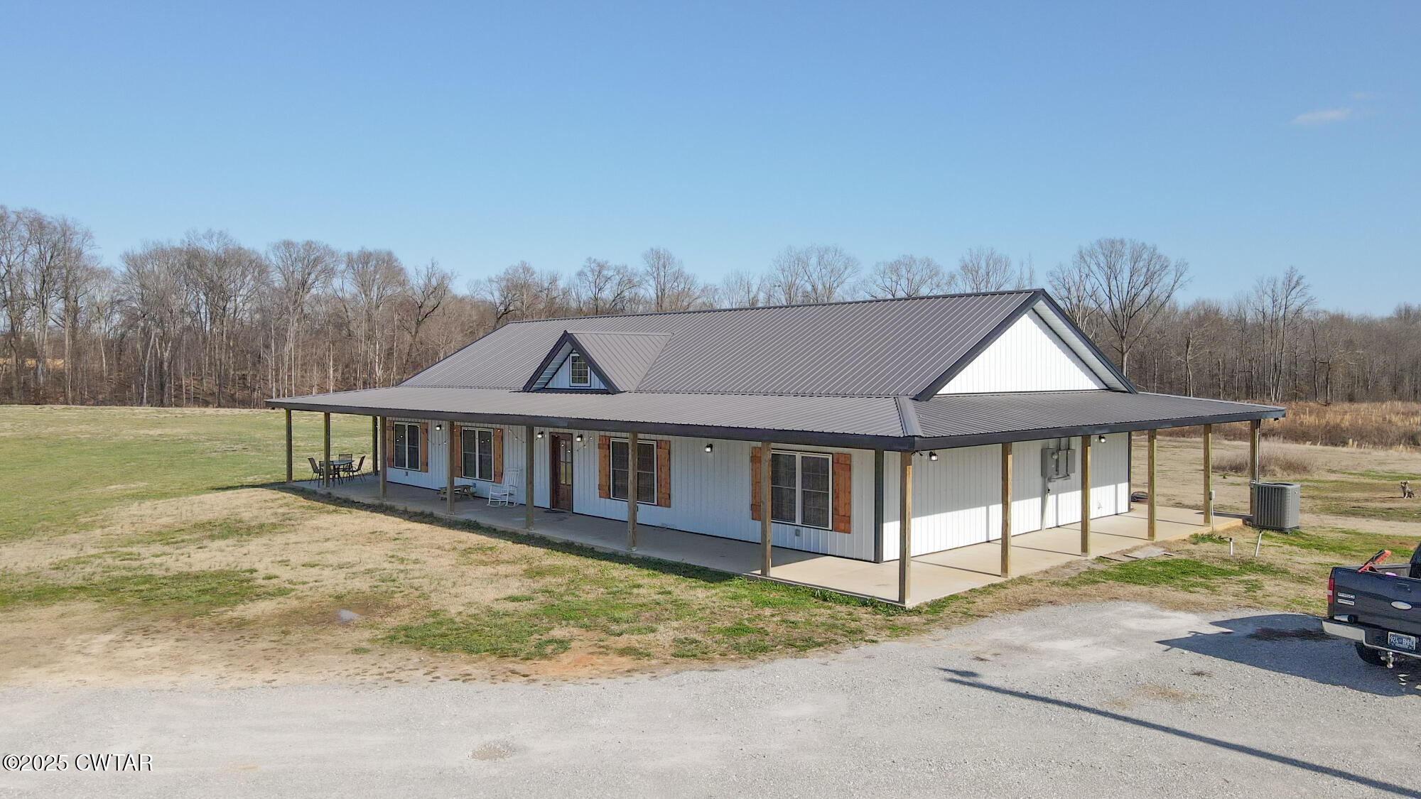 1375 White Clay Road Sharon, TN 38255 - Photo 7 of 58 a view of a house with backyard and porch