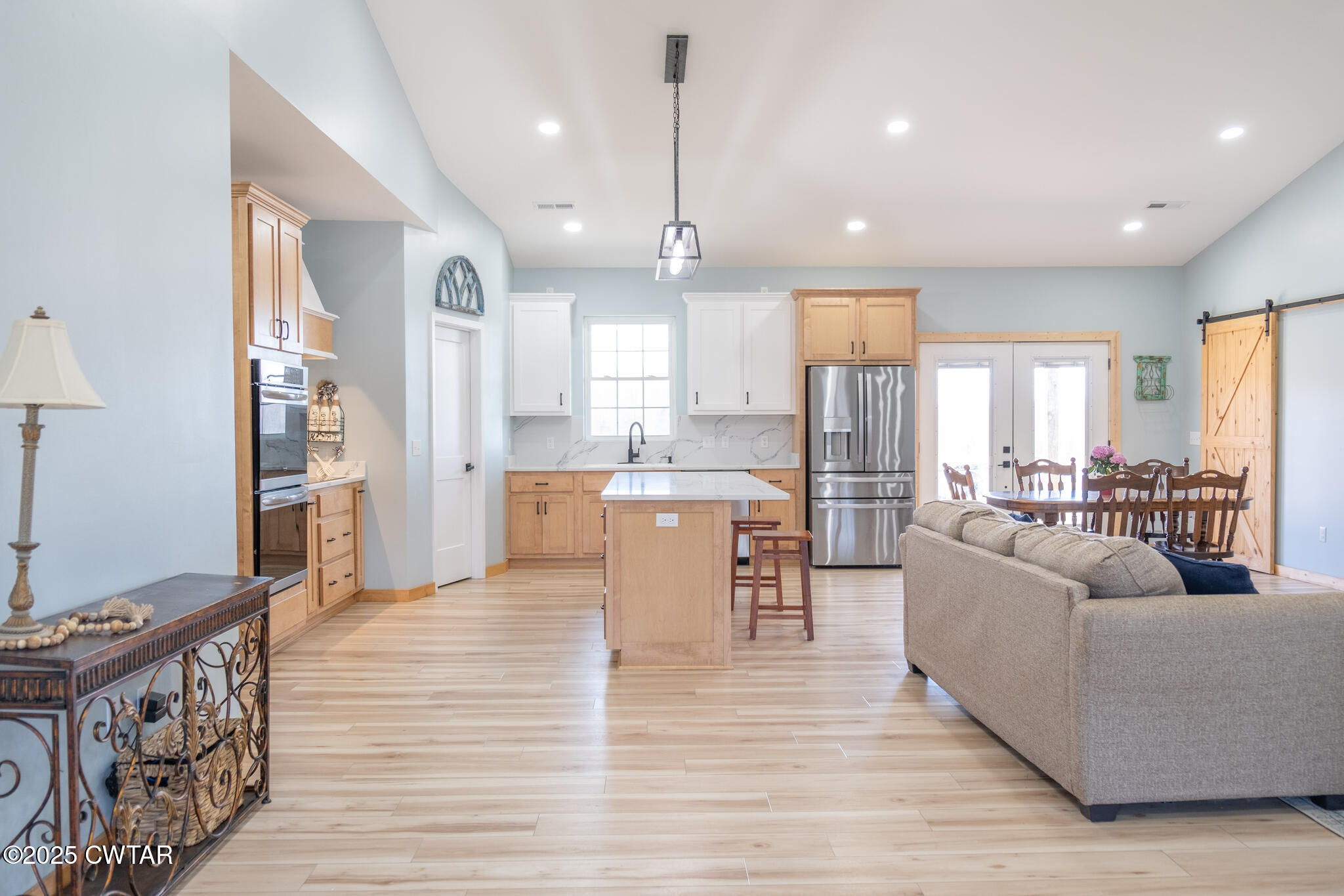 1375 White Clay Road Sharon, TN 38255 - Photo 9 of 58 a living room with furniture and a wooden floor