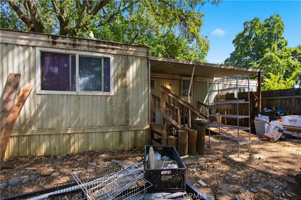 2465 Palermo Road, Unit 12 Palermo, CA 95968 - Photo 4 of 18 a view of a house with a patio
