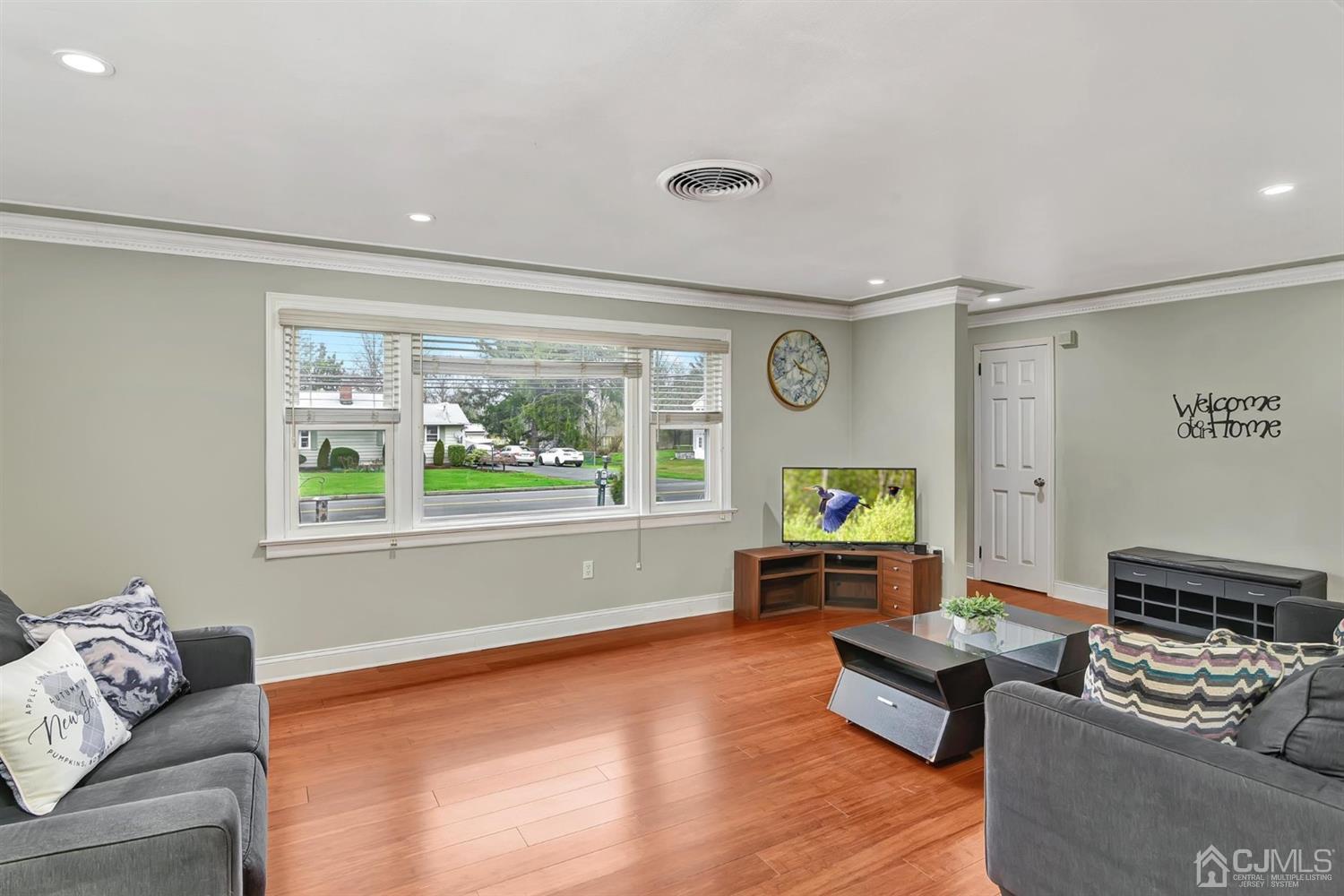 423 Ridge Road Dayton, NJ 08810 - Photo 4 of 29 a living room with furniture and a window