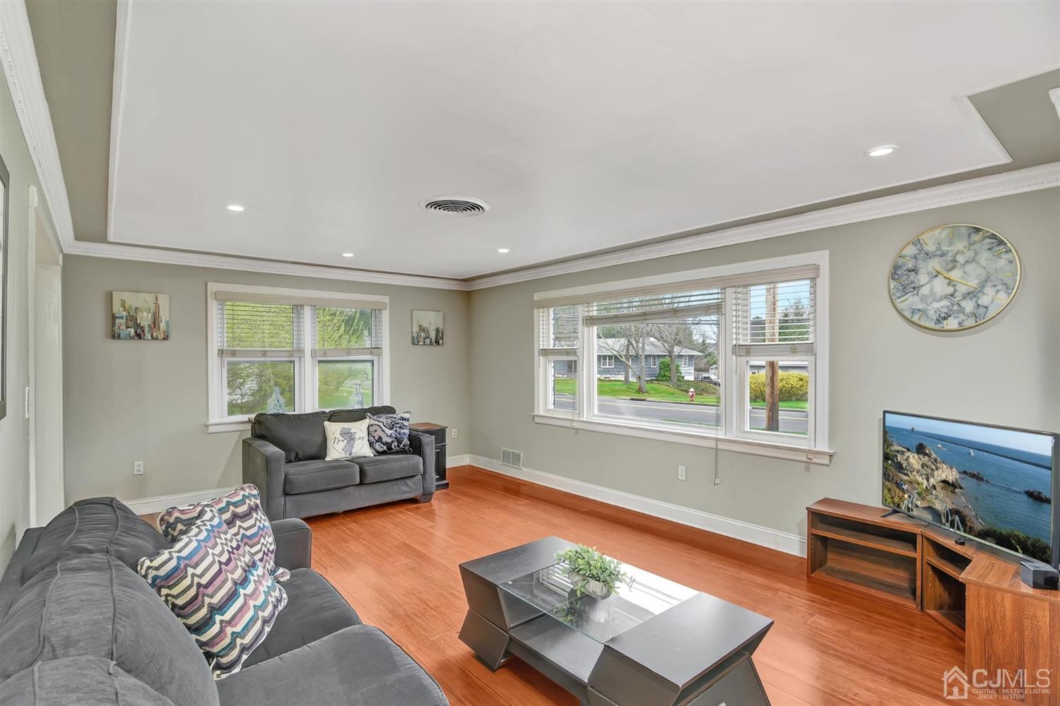 423 Ridge Road Dayton, NJ 08810 - Photo 5 of 29 a living room with furniture and a window