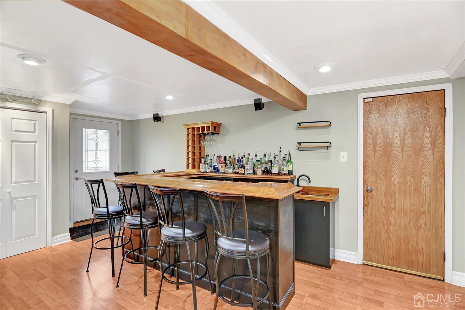 423 Ridge Road Dayton, NJ 08810 - Photo 8 of 29 a table and chairs in a room