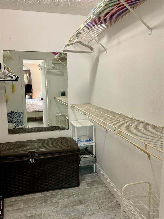 3213 South Beneva Road, Unit 204 Sarasota, FL 34232 - Photo 11 of 18 a room with a washing machine and cabinets