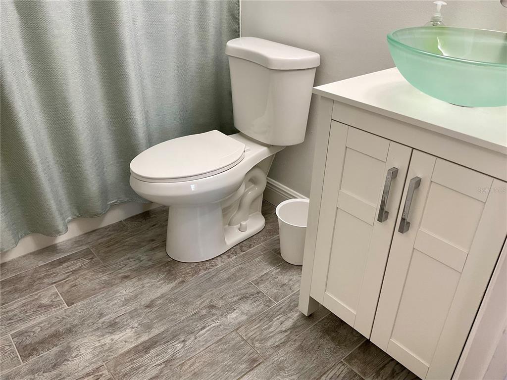 3213 South Beneva Road, Unit 204 Sarasota, FL 34232 - Photo 15 of 18 a bathroom with a sink and a toilet