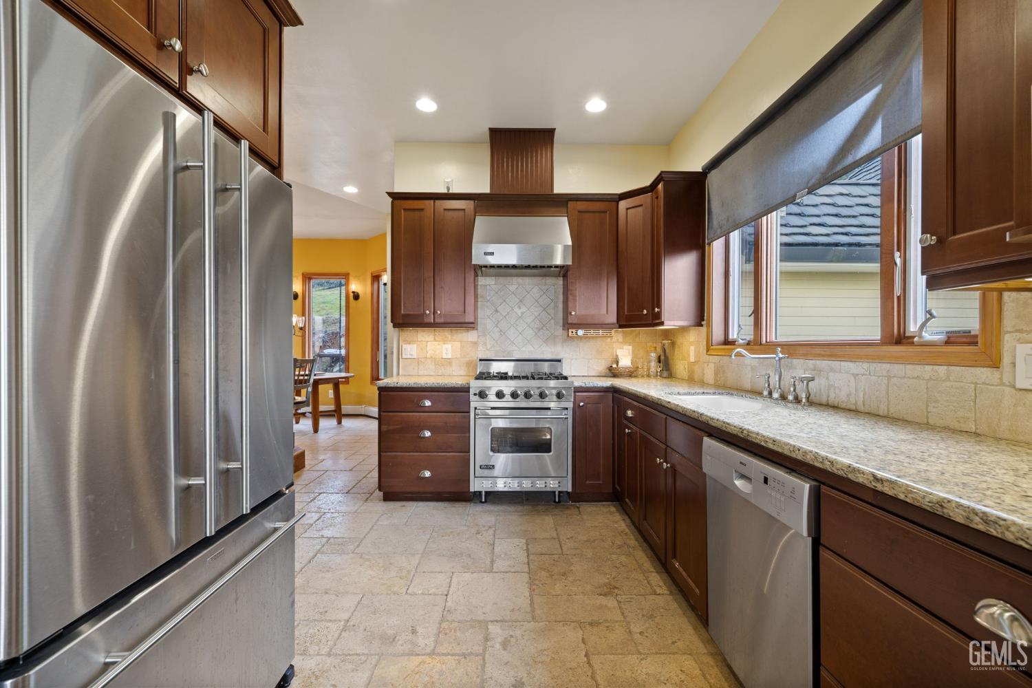 Undisclosed Address Lebec, CA 93243 - Photo 13 of 49 a large kitchen with stainless steel appliances granite countertop a refrigerator and a sink