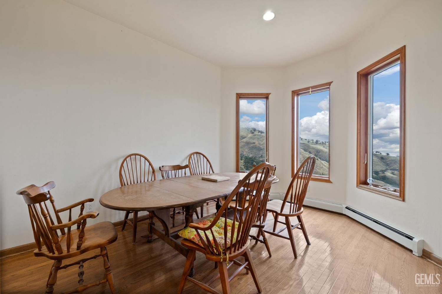 Undisclosed Address Lebec, CA 93243 - Photo 20 of 49 a view of a dining room with furniture window and wooden floor