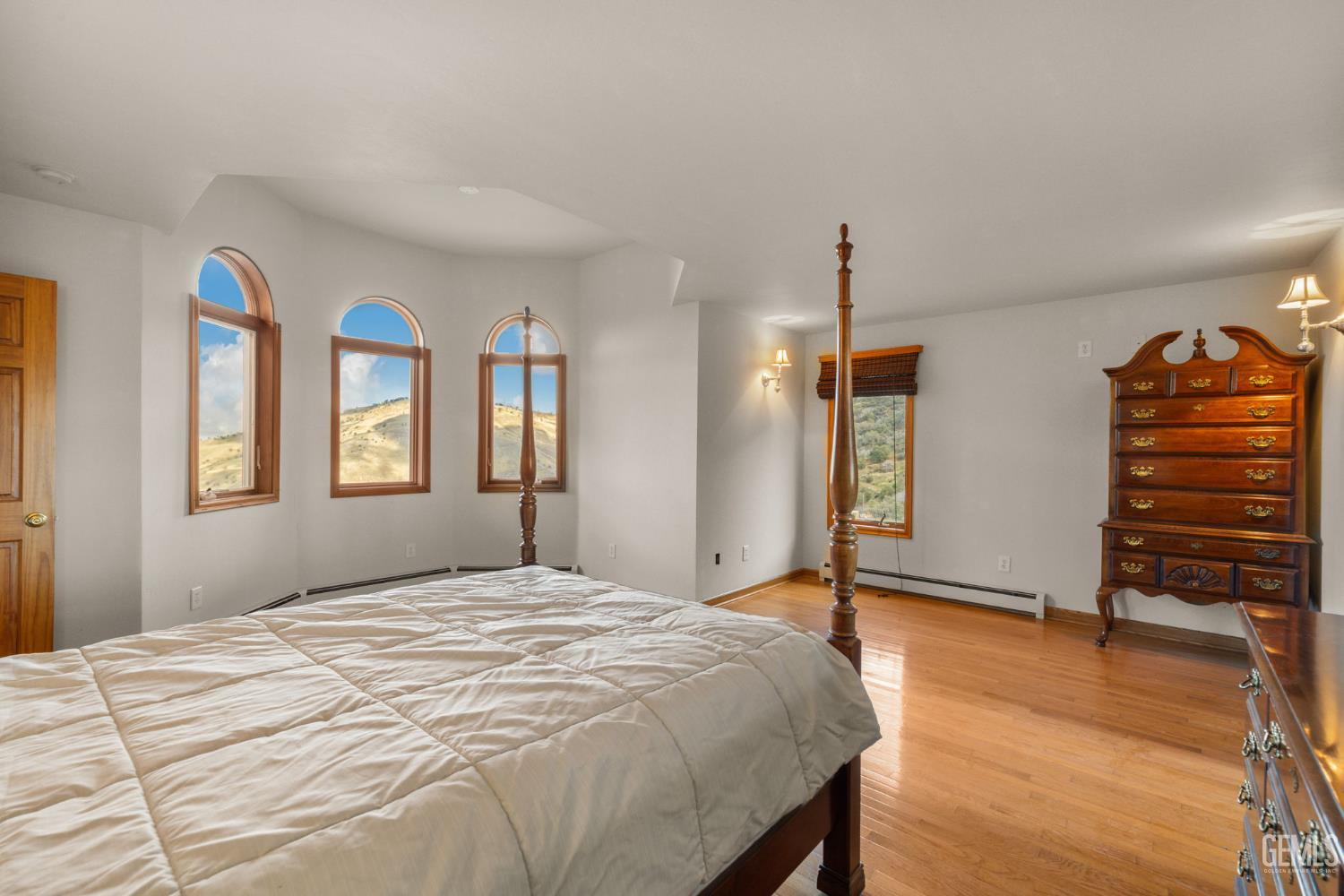 Undisclosed Address Lebec, CA 93243 - Photo 23 of 49 a bedroom with a bed and a dresser