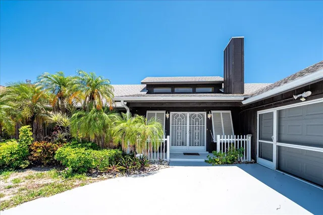 a house view with a garden space