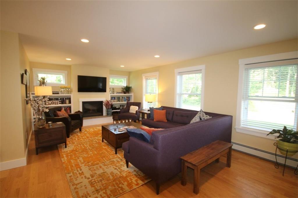 8 Meadow Cove Road East Boothbay, ME 04544 - Photo 4 of 25 The living room with gas fireplace...