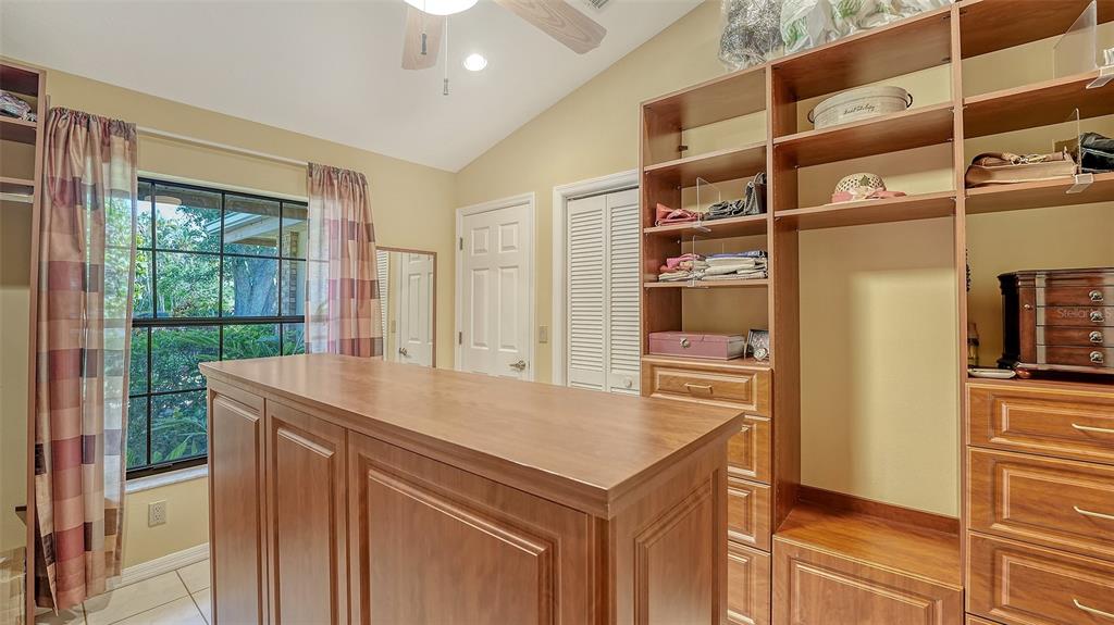 7426 Weeping Willow Boulevard Sarasota, FL 34241 - Photo 38 of 66 a kitchen that has a sink and a stove