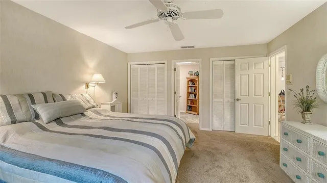 an aerial view of a house with garden space and street view