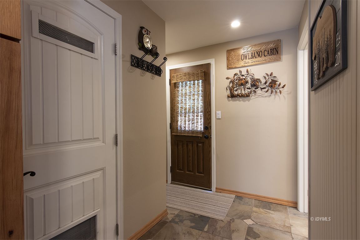 55180 Dickenson Road Idyllwild, CA 92549 - Photo 22 of 38 Hallway to main level Bedroom + Bath