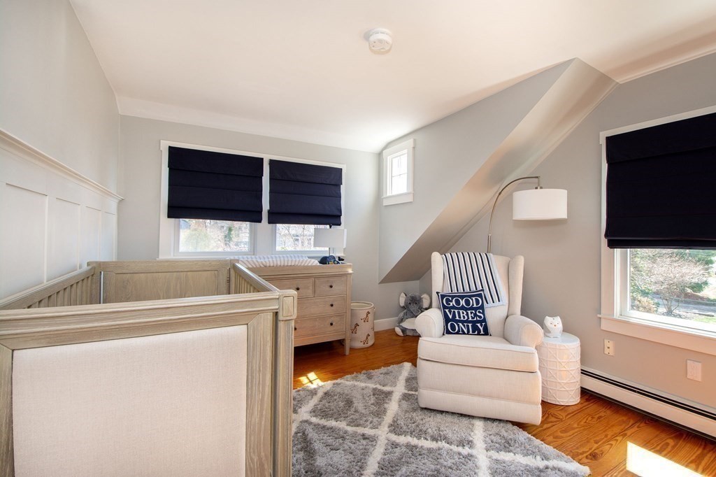 12 Hawley Road Scituate, MA 02066 - Photo 19 of 36 a living room with furniture and a flat screen tv