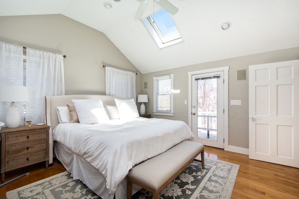 12 Hawley Road Scituate, MA 02066 - Photo 24 of 36 a bedroom with a bed and wooden floor
