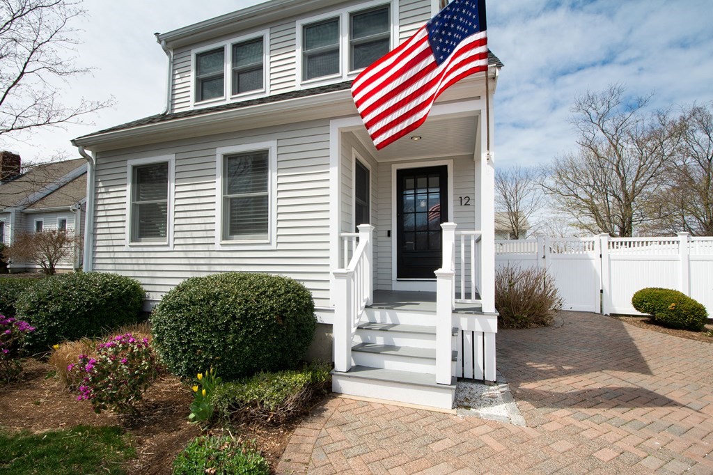 12 Hawley Road Scituate, MA 02066 - Photo 3 of 36 a front view of a house with garden
