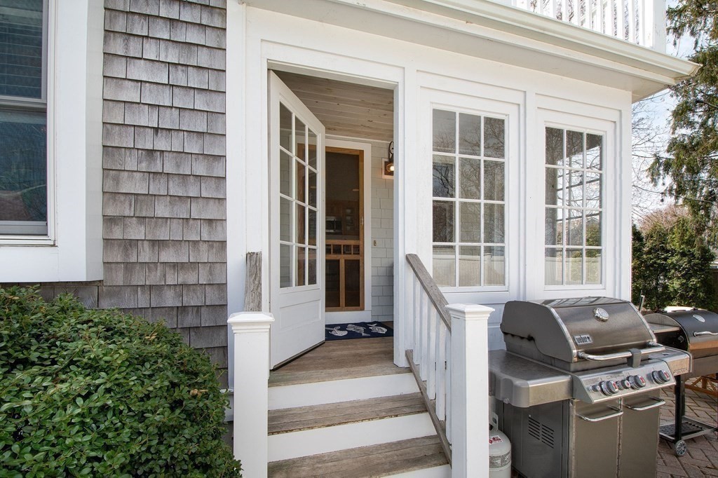 12 Hawley Road Scituate, MA 02066 - Photo 31 of 36 a view of a house with more windows and brick walls
