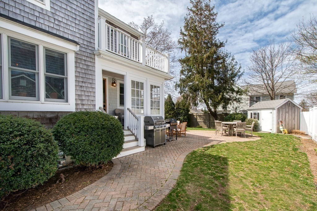 12 Hawley Road Scituate, MA 02066 - Photo 32 of 36 a view of a patio with chair and tables
