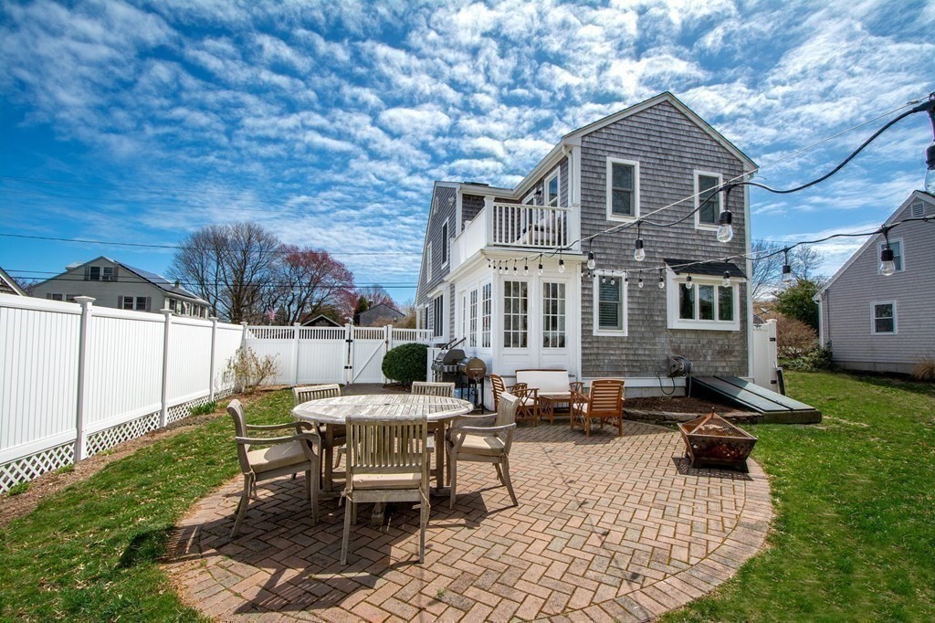 12 Hawley Road Scituate, MA 02066 - Photo 33 of 36 a view of a house with backyard porch and sitting area