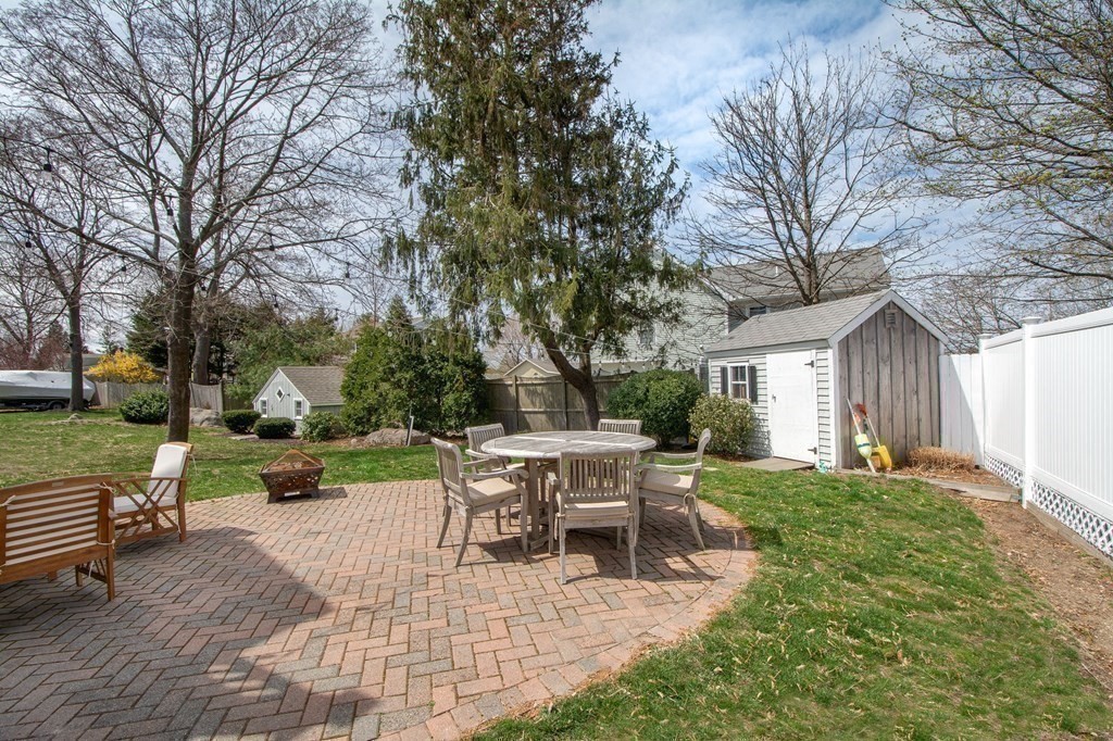 12 Hawley Road Scituate, MA 02066 - Photo 35 of 36 a view of a house with backyard sitting area and garden