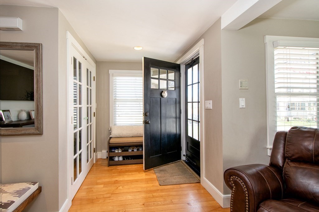 12 Hawley Road Scituate, MA 02066 - Photo 5 of 36 a living room with furniture and a flat screen tv