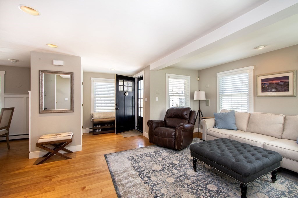 12 Hawley Road Scituate, MA 02066 - Photo 7 of 36 a living room with furniture and a rug