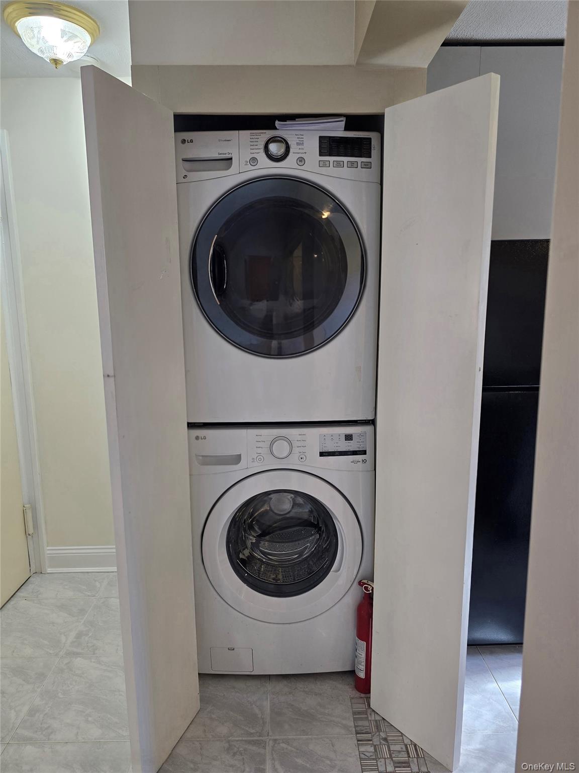 86-06 155th Avenue, Unit 4 Queens, NY 11414 - Photo 10 of 11 a utility room with dryer and washer
