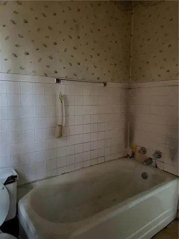 a bathroom with a bathtub