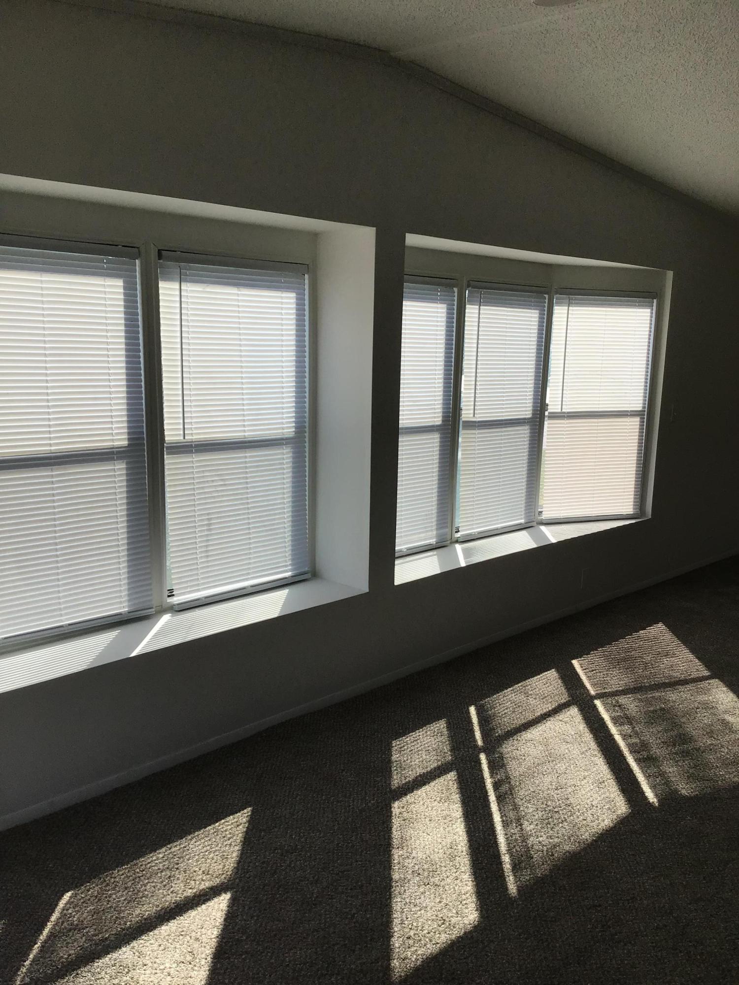 23091 Tradewind Road Boca Raton, FL 33428 - Photo 11 of 20 Family Room with Bat Windows