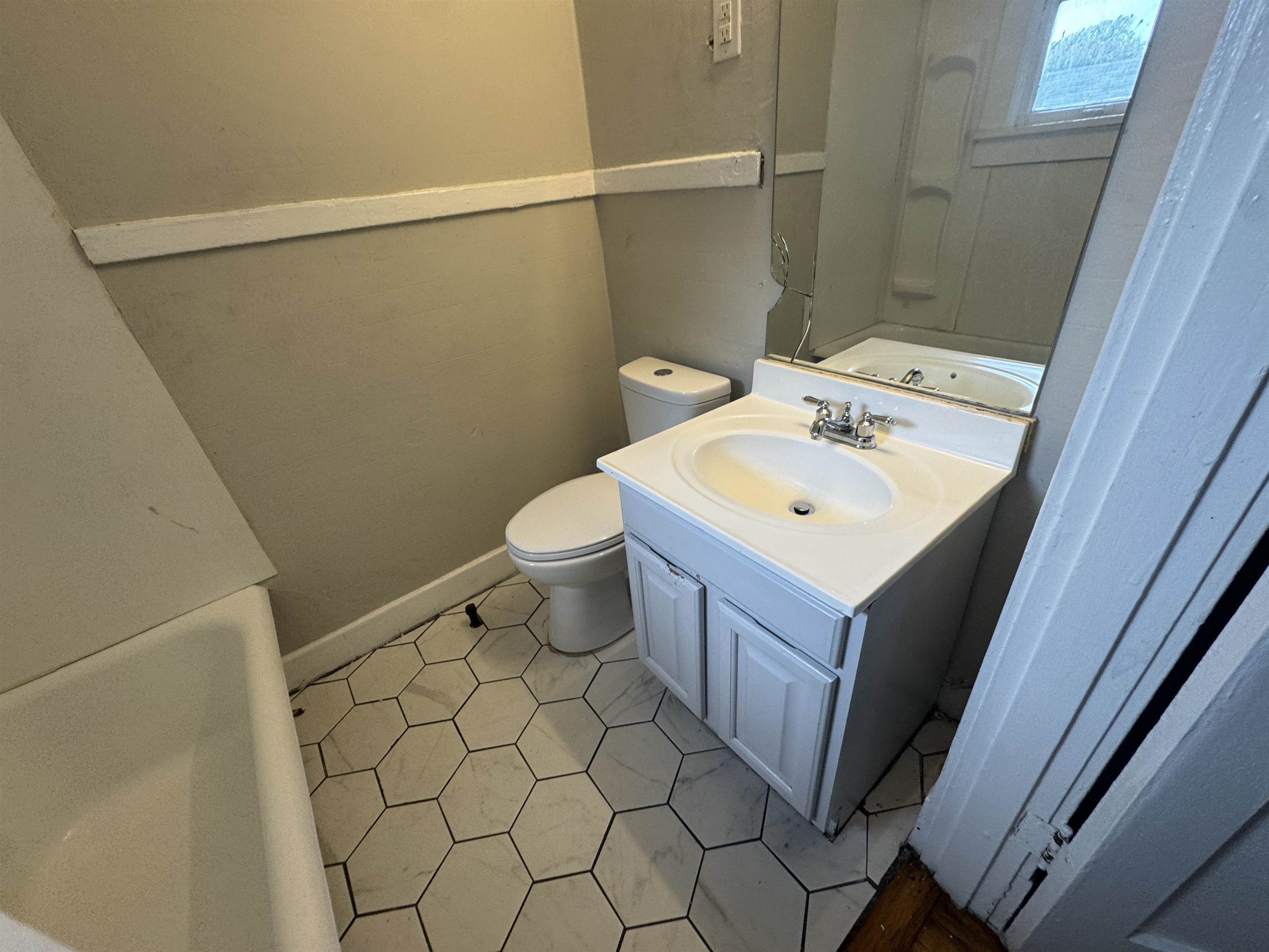 2012 Carnes Avenue Memphis, TN 38114 - Photo 25 of 28 a bathroom with a sink and a toilet
