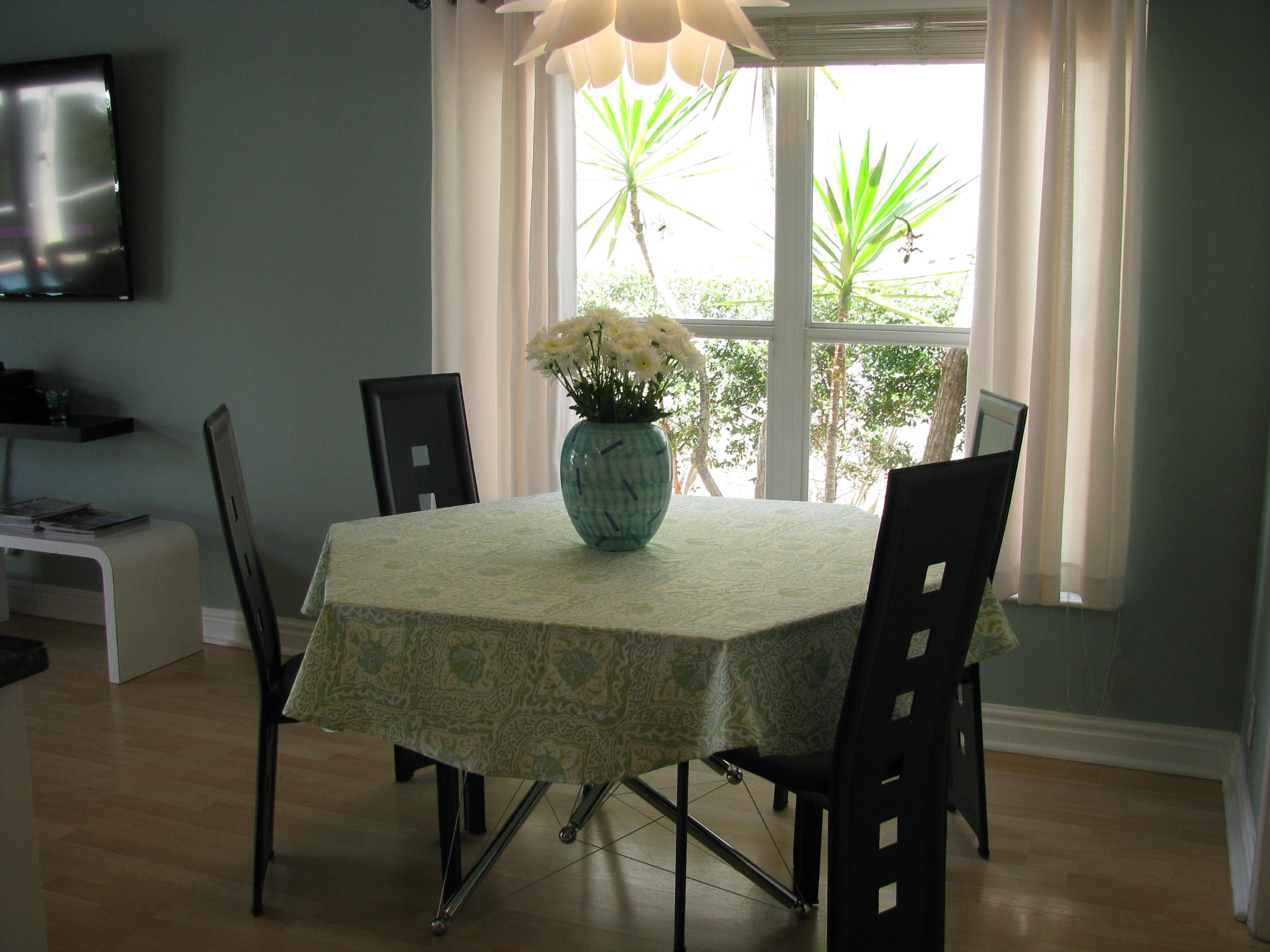 103 Waterbridge Lane Jupiter, FL 33458 - Photo 8 of 47 a view of a dining room with furniture window and outside view