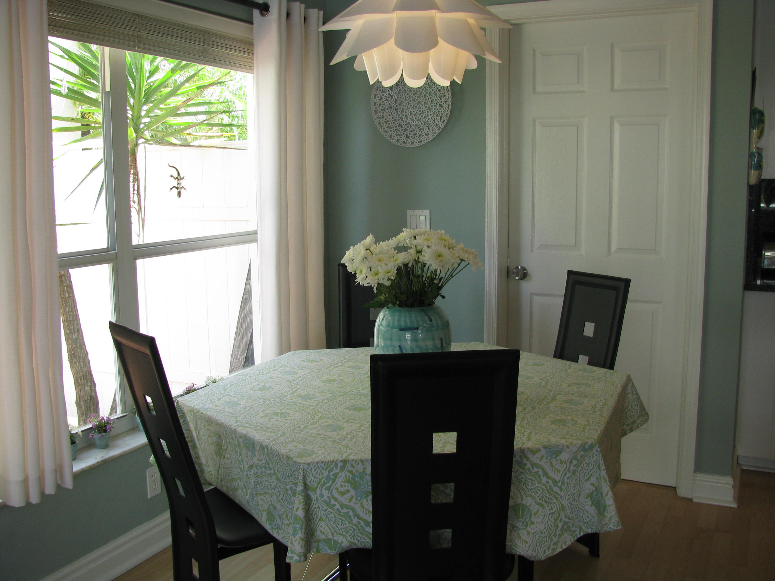 103 Waterbridge Lane Jupiter, FL 33458 - Photo 9 of 47 a dining room with furniture and window