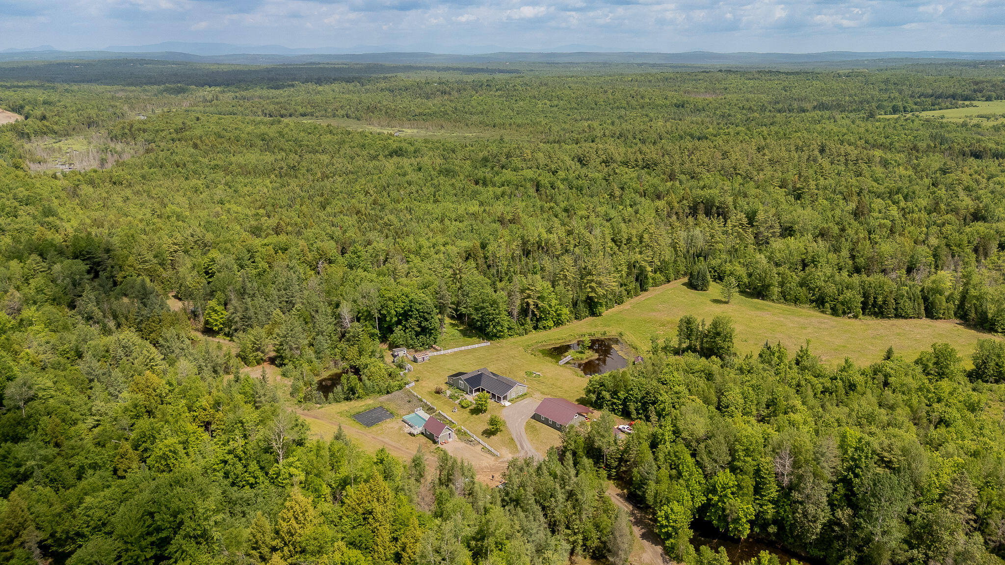 154 Merrills Mills Road Dover-Foxcroft, ME 04426 - Photo 143 of 145 DJI_20260612111332_0762_D