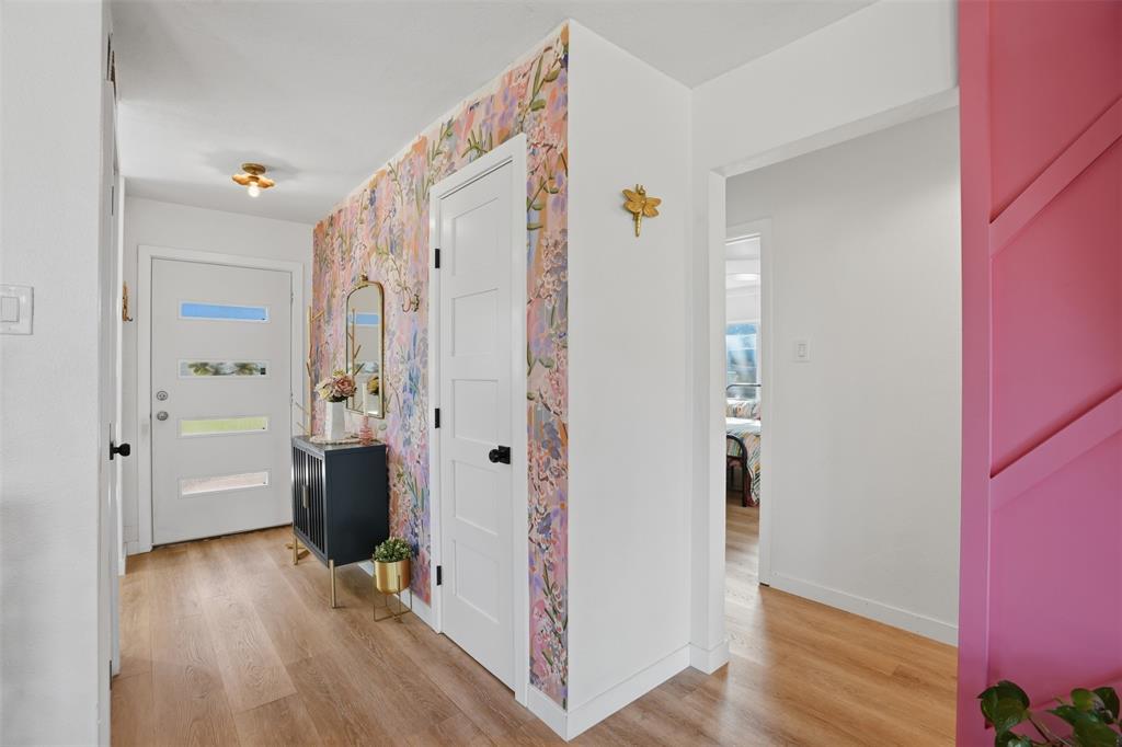 1008 Ridgewood Terrace Arlington, TX 76012 - Photo 11 of 40 a view of closet area with wooden floor
