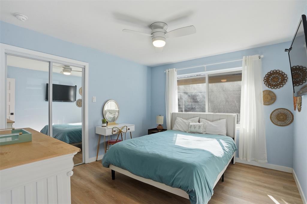 1008 Ridgewood Terrace Arlington, TX 76012 - Photo 21 of 40 a bedroom with a bed and a window