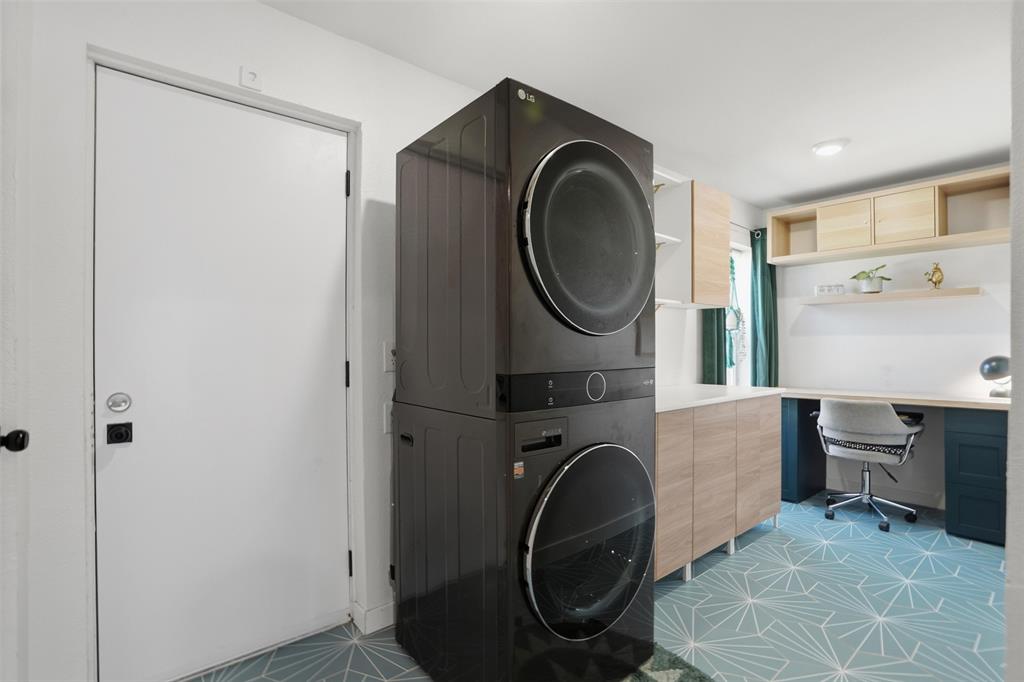 1008 Ridgewood Terrace Arlington, TX 76012 - Photo 28 of 40 a view of a storage & utility room with washer and dryer